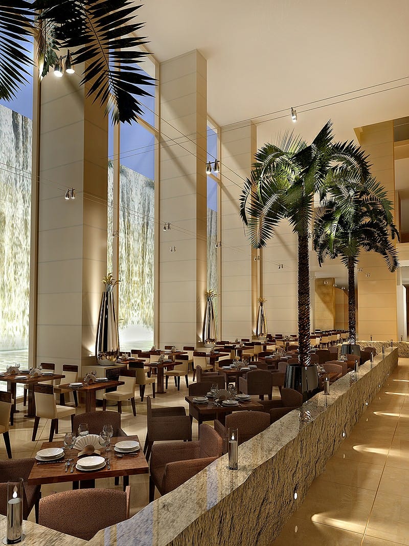 Ресторан с пальмами и каменными стенами-водопадами